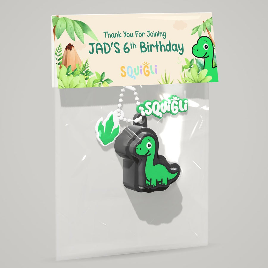 Dinosaur return gift bag with a header card for Jad's 6th birthday